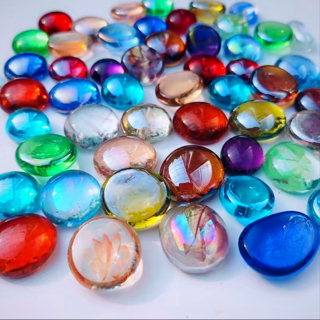 Aquarium Fish Guppy - Colorful small stones mixed with glass